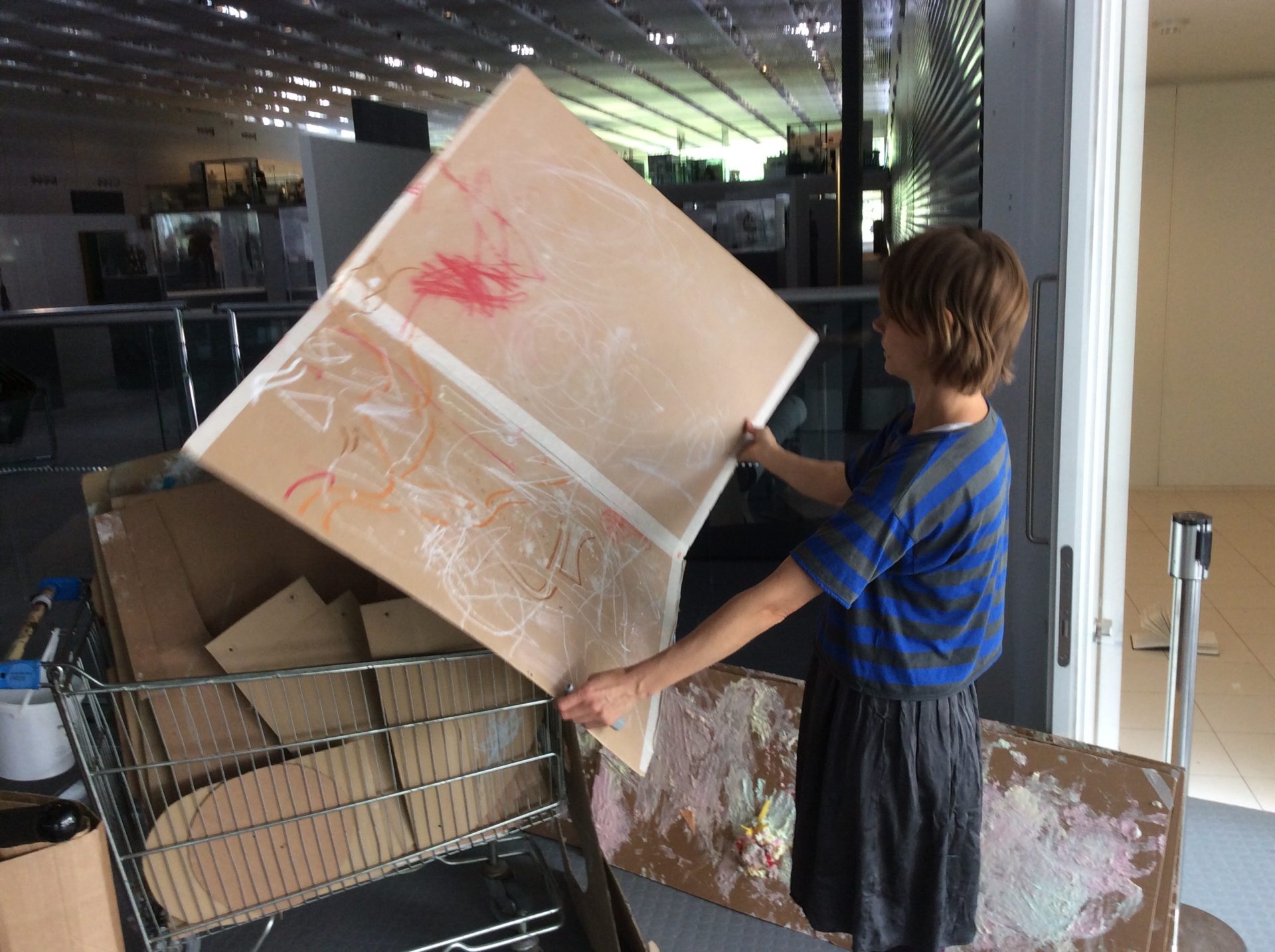 cardboard sheet, person, shopping trolley