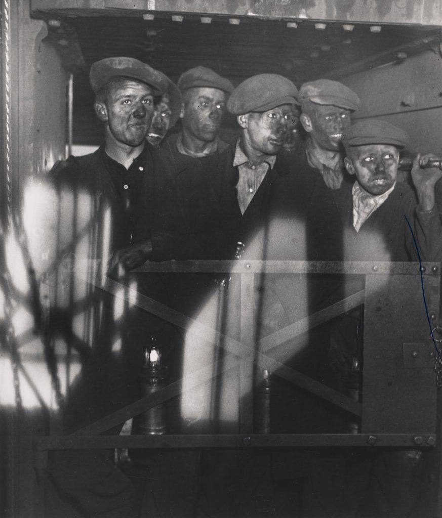 Black and white photograph of miners