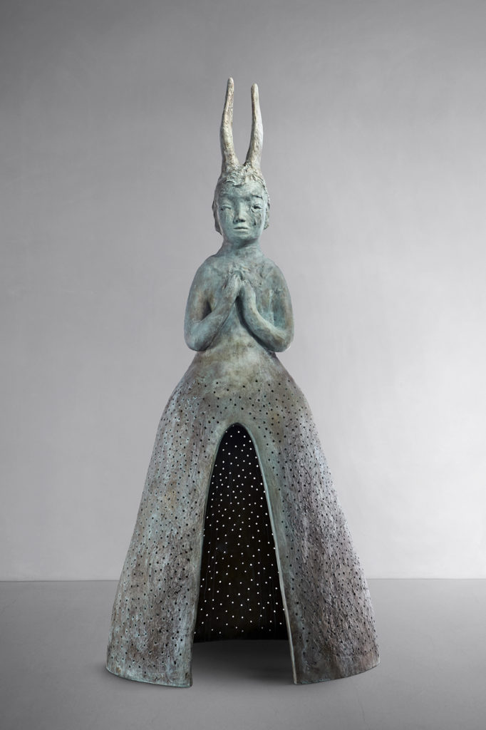 A sculpture by artist Leiko Ikemura depicting a hybrid between a female buddha and a rabbit