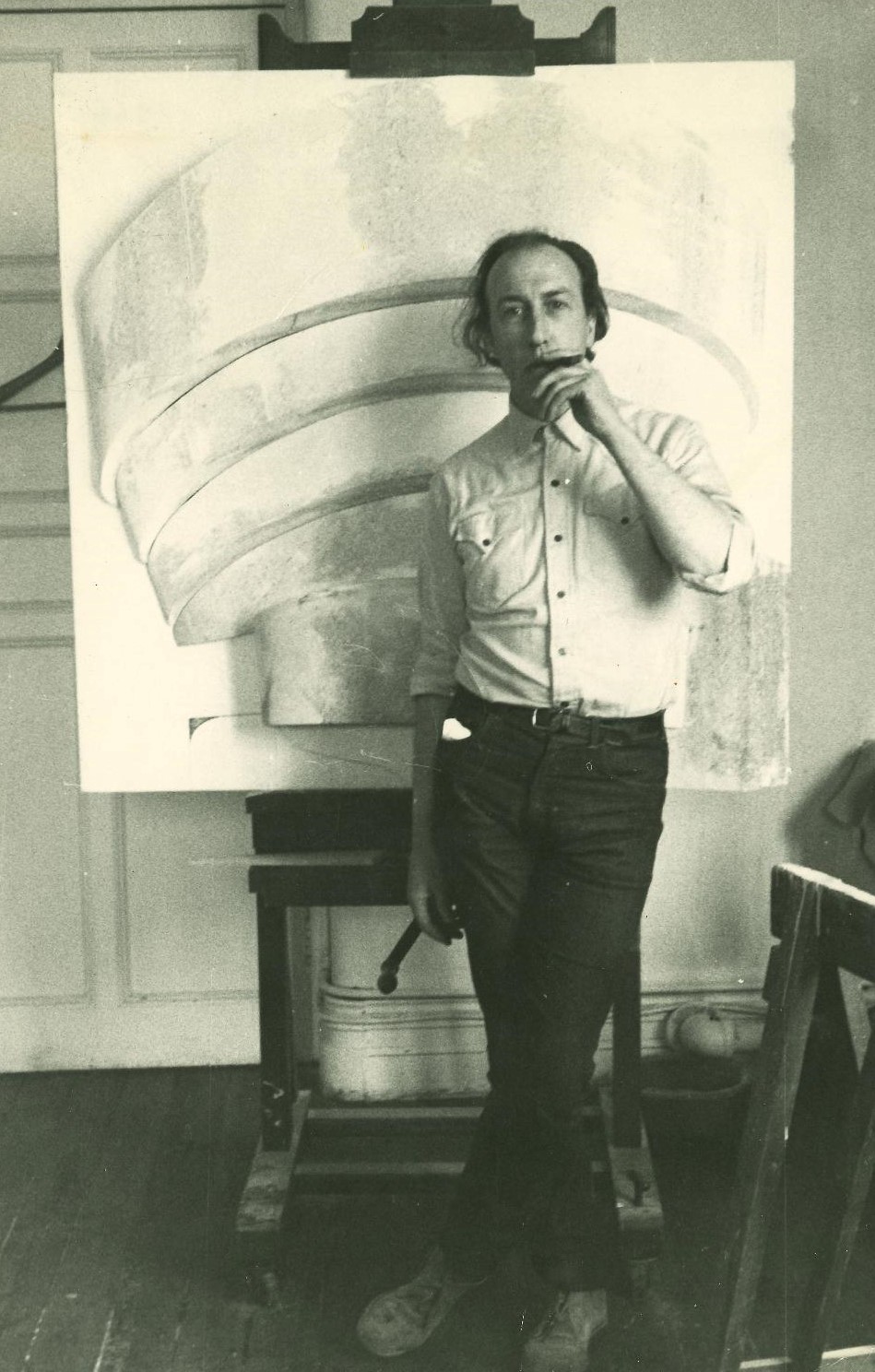 Mary Webb Archive Image 7 Mary Webb's tutor, the artist Richard Hamilton in front of one of his iconic relief paintings of the Guggenheim Museum, photographed at Newcastle, 1964.